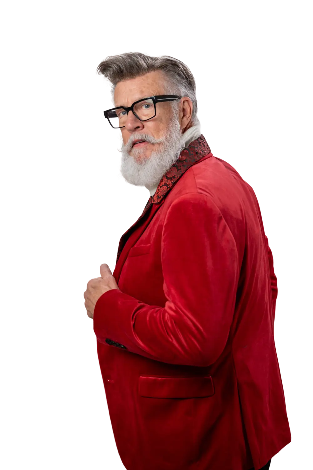 A man in his sixties wearing a Superhairpieces hair system, turning to the camera.